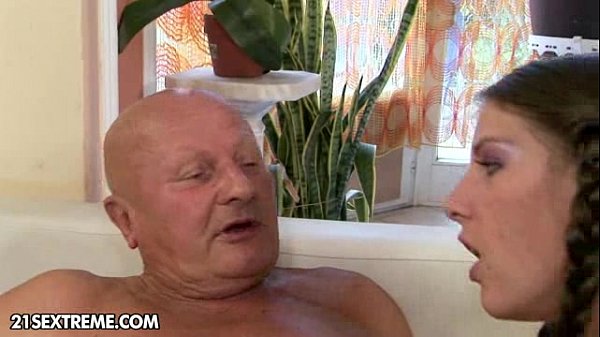 Young brunette gives boyfriend a blowjob