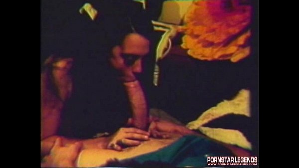 John Holmes fucks a slut with his huge cock in a vintage retro scene