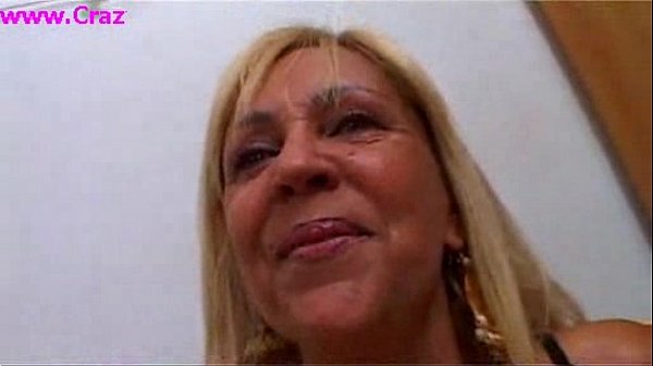 Blonde milf with big tits takes facial cumshot