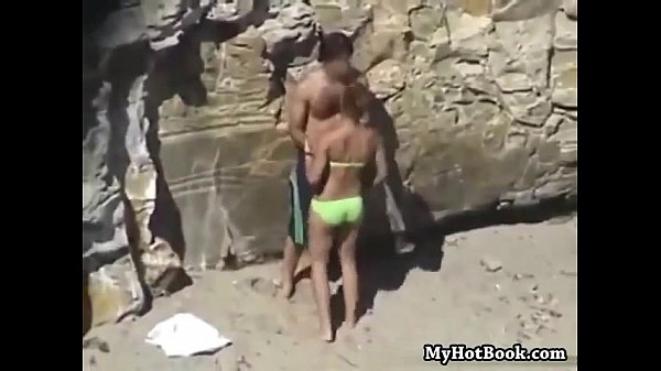 woman caught having doggy style quicky on public beach