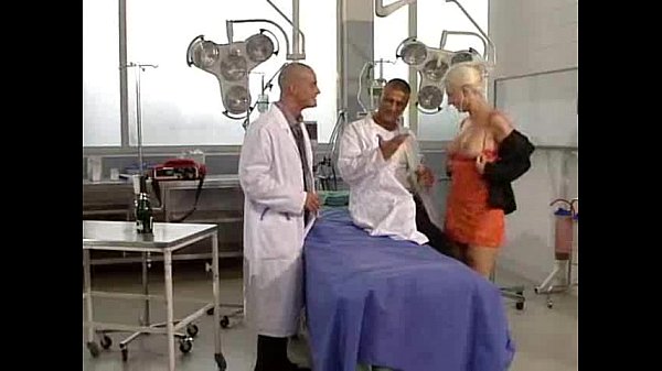 Doctors performing group sex in a hospital setting