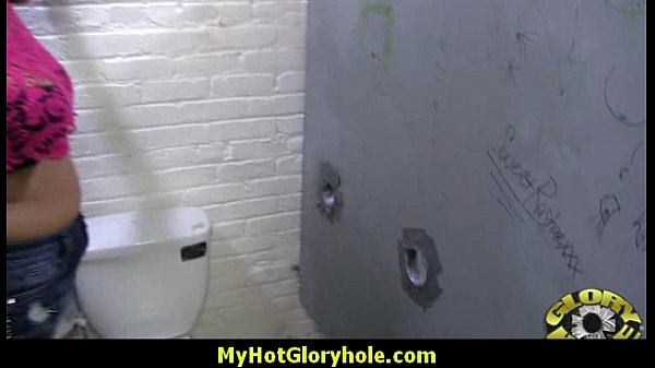 Black girl sucks big black cock at gloryhole