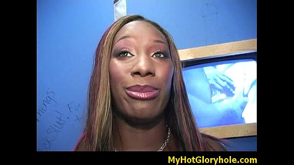 Ebony woman blows black man through gloryhole