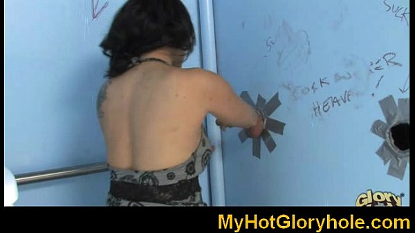 Ebony girl gives gloryhole blowjob