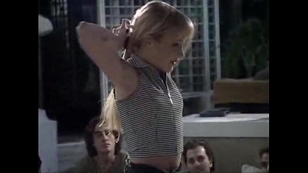 Sandy gets a mouthjob and takes a cumshot in a gangbang with multiple guys in Italy