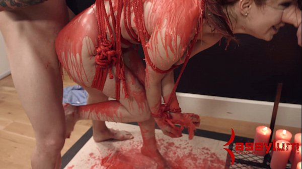 Redhead milf gets restrained with hot wax bondage by Assylum