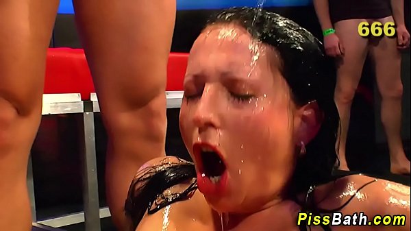 Mia-Ava in a golden shower bukkake scene