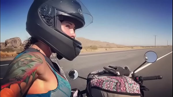 Felicity Feline gets naked riding an Aprilia Tuono motorcycle