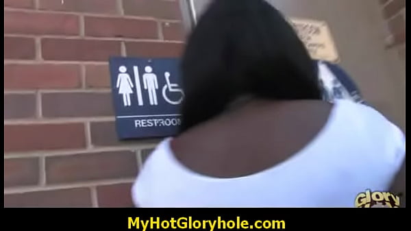 Ebony girl gives anonymous gloryhole blowjob