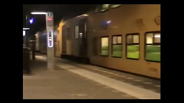 Blonde girl masturbating and flashing in public at a train station