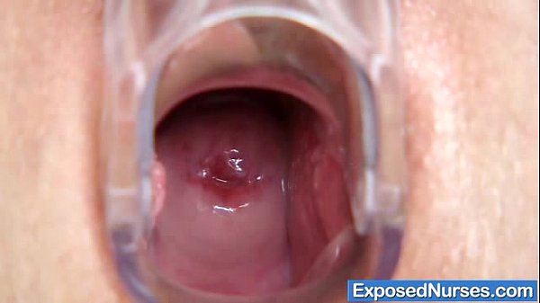 Blonde nurse Uma Zex fingers her pussy in fishnets