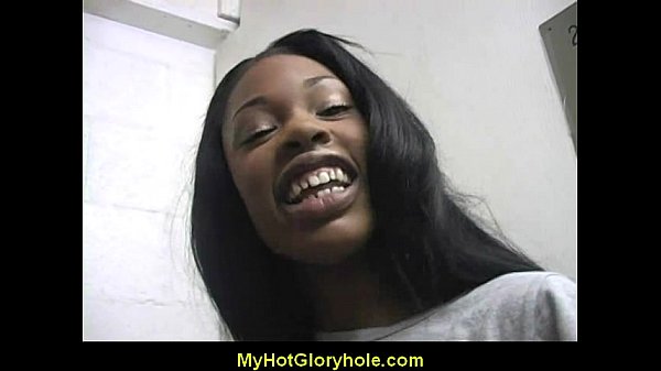 Ebony woman gives interracial gloryhole blowjobs