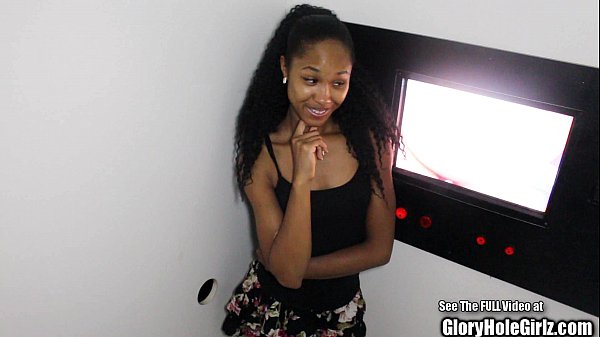 Petite black girl sucks cock at glory hole