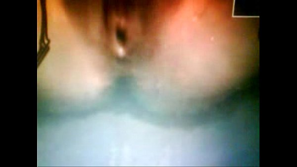 Colombian girl getting wet in the pool with her friends