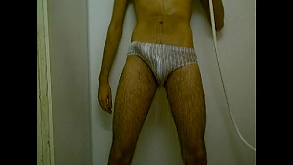 Young teen girl pees in shower