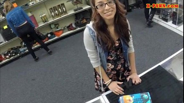 Brunette college girl gives blowjob at pawnshop