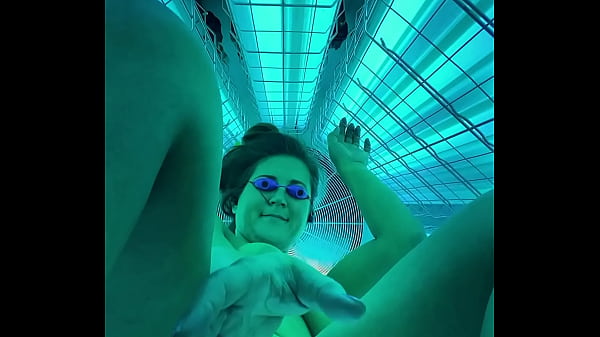Miss Luci spreads ass in public tanning booth