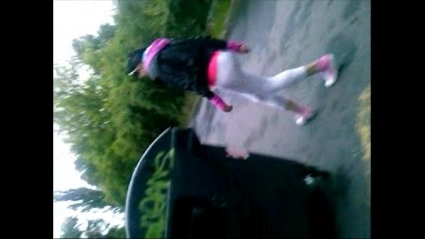 Teen in shiny leggings shows cameltoe outdoors