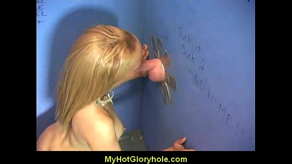 Ebony woman sucks white cock at gloryhole