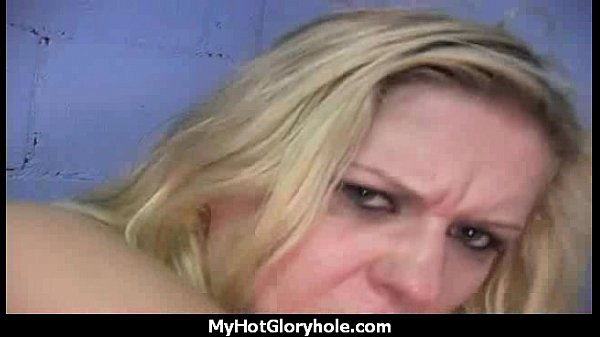 White milf sucks and blows black cock in a public gloryhole
