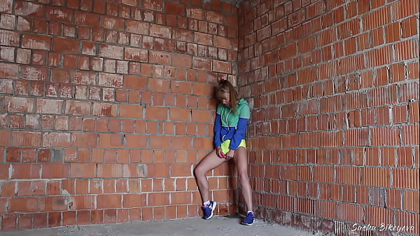 Sasha Bikeyeva gets caught masturbating by a construction worker after a run at an outdoor construction site