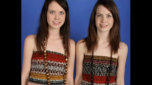 Identical lesbian twins posing together and showing off their naked bodies