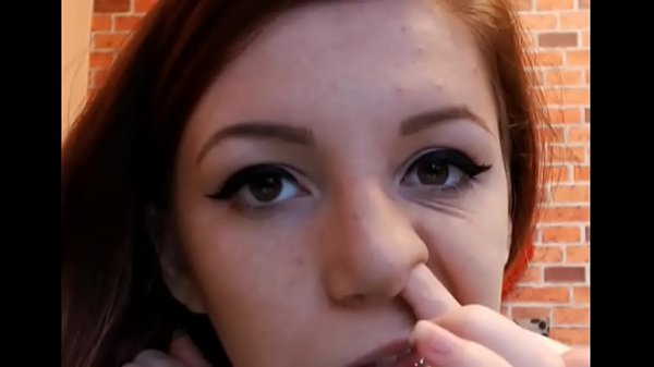 girl picks her nose and shows her boobs