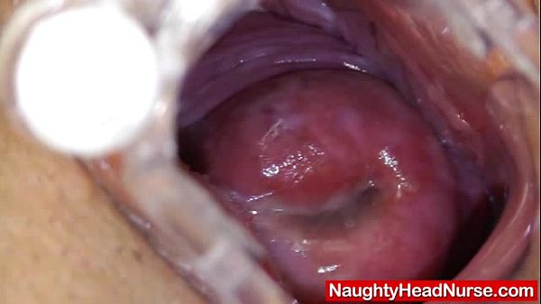 Speculum inserted in a tight mature mom's pussy