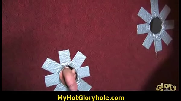 Ebony girl sucks cock at gloryhole