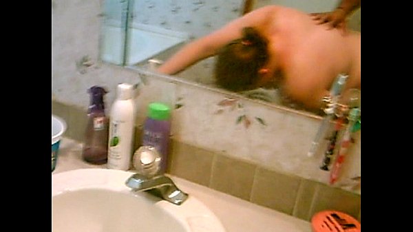 Blond milf Marti caught in bathroom