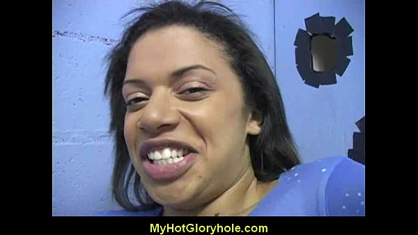 Ebony woman gives interracial gloryhole blowjobs