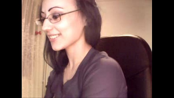 Brunette Romanian girl in glasses teases alone