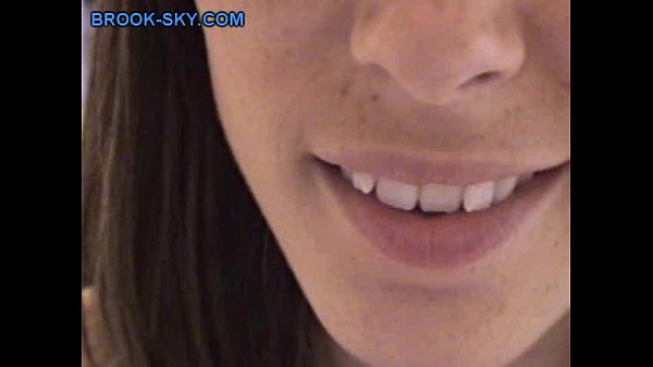 brunette teen plays with herself in front of mirror