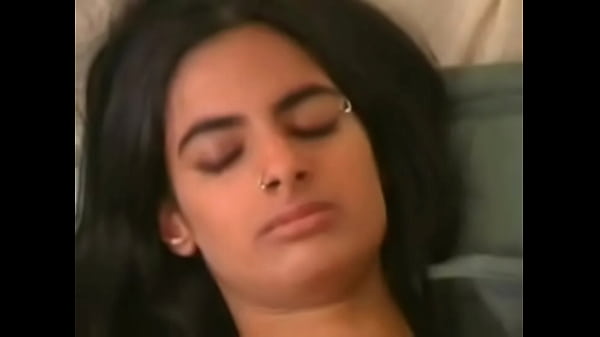 Indian girl masturbates with dildo in socks
