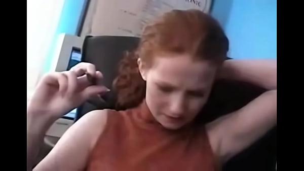 Redhead Ivy masturbates alone showing off freckled skin