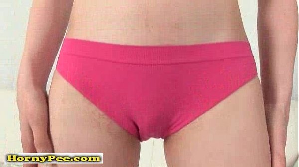 Masturbating brunette teen pisses on dildo in stockings