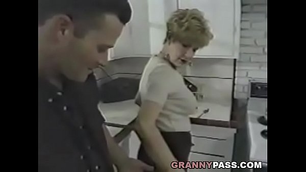 Granny seduces young guy in the kitchen