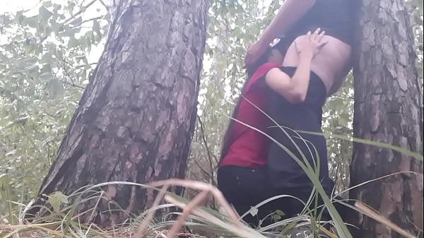 Lesbians have sex under tree in rain