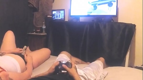 Curvy Kate 1023 gives blowjob in video game room