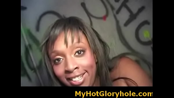 Black babe sucking cock at a gloryhole initiation