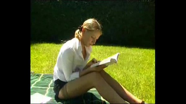 Blonde French teen gives blowjob in pigtails outdoors
