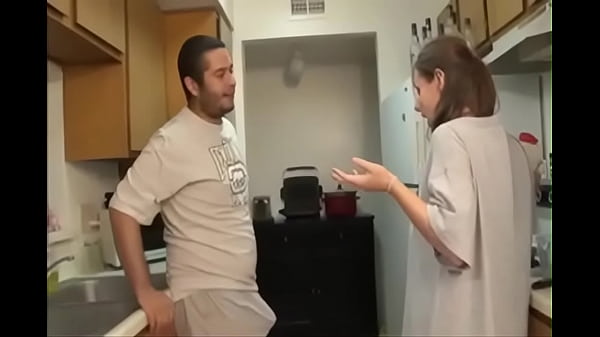 Step brother and sister share a blowjob in the kitchen