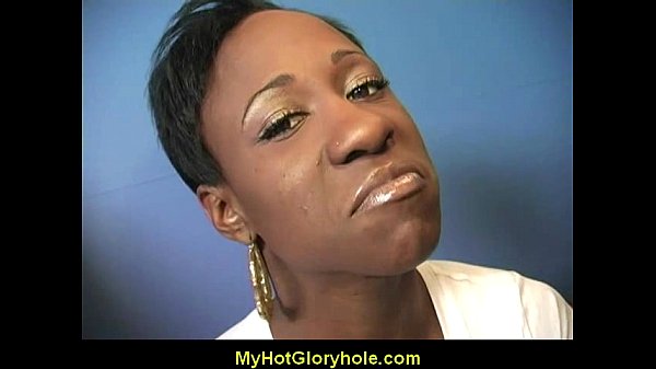 Ebony woman sucks white cock at gloryhole