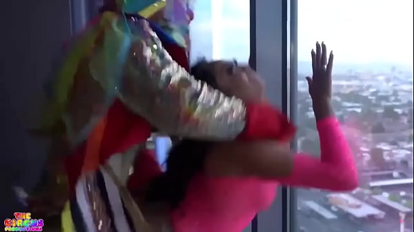 Cali Caliente gets pounded by a black-clad clown