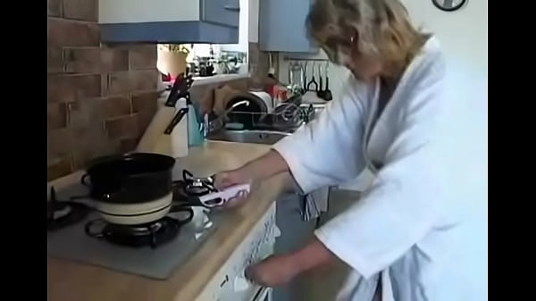 Granny in glasses gets pussy licked in kitchen