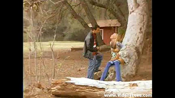 Blonde girl gives blowjob in public park
