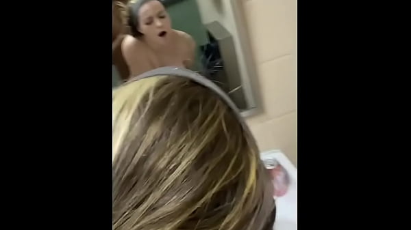 Brunette babe bent over public bathroom sink doggystyle