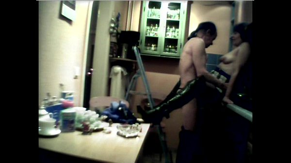 Brunette housewife sucks cock in kitchen