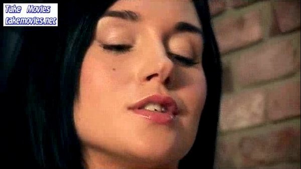Young brunette teen masturbates on the couch