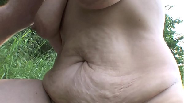 MILF cheats with her young boyfriend outdoors